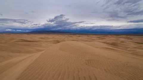 Thunderstorm in the desert. Dramatic sky over sand dune. Timelapse. Stock Footage 114213961