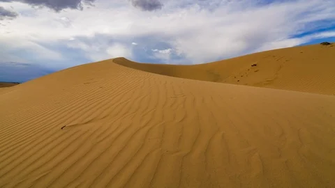 Thunderstorm in the desert. Dramatic sky over sand dune. Timelapse. Stock Footage 116648804