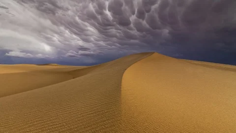 Thunderstorm in the desert. Dramatic sky over sand dune. Timelapse. Stock Footage 116719681