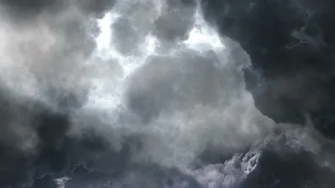 A thunderstorm with a flash  within a gray cumulus cloud. Stock Footage 201203627