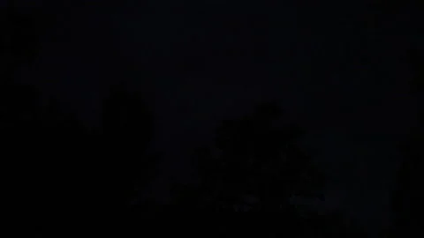 Thunderstorm flashes lightning during night Stock Footage 236294454