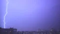 The thunderstorm with lightning above a night city. slow motion 4k or 4k+ Resolution