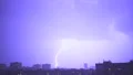 The thunderstorm with lightning above the night city. slow motion 4k or 4k+ Resolution