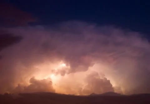 Thunderstorm Lightning at cloudy dark rainy sky. Stock Photos