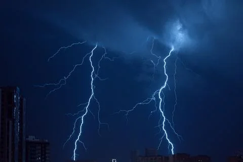 Thunderstorm. Lightning in the night blue sky over the city Fotos Stock