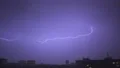 The thunderstorm with lightning over the night city. slow motion 4k or 4k+ Resolution