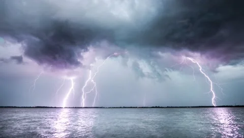 Thunderstorm with lightning over ocean nature background  Loopable Stock Footage 156183304