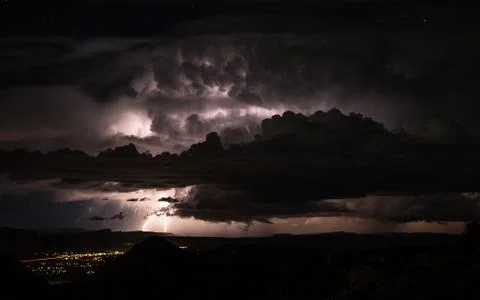Thunderstorm lightning strike over Moab Utah in desert monsoon rainstorm. Stock Photos