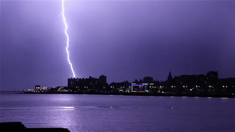 Thunderstorm over the City, a Lightning Flashes during a Thunderstorm. 4K. Stock-Footage 147470836