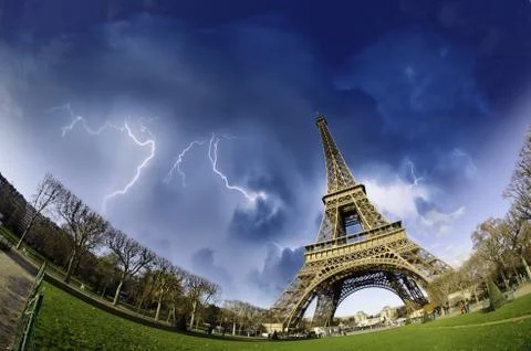 Thunderstorm over Eiffel Tower in Paris Stock Photos