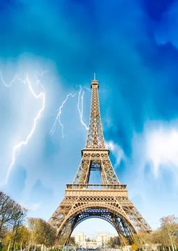 Thunderstorm over Eiffel Tower in Paris Stock Photos