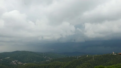 Thunderstorm over mountains, lightening flash on gray sky, Barcelona Stock Footage 99886843