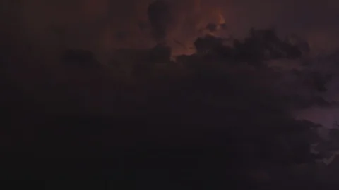 Thunderstorm over the sea with continuous flashes of lightning.  Crop variant. Stock Footage 128730398