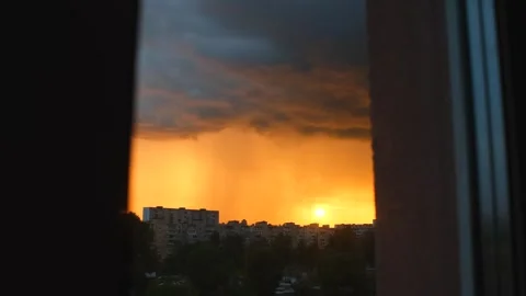 Thunderstorm with rain. Cloudy sky with heavy rain, view from window. Cinematic Stock Footage 253387886