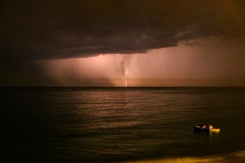 Thunderstorm on a sea Stock Photos