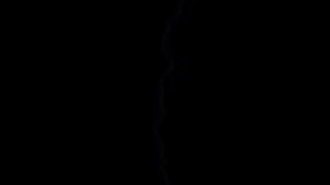 Thunderstorm strikes with lightning on a dark night sky Stock Footage 338236975