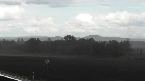 Thür, Germany - 08 29 2025: Traffic to Flugplatz Mendig in the heavy rain 스톡 동영상 315947191