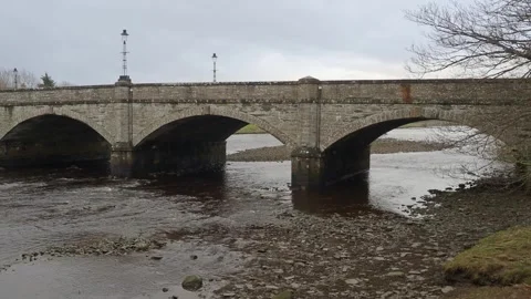 Thurso A9 Bridge Crossing the River Thurso on a Dull Spring Day Stock Footage 332069150