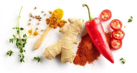 Thyme, curry powder, red bell pepper, ginger root, paprika powder and white p Stock-Fotos
