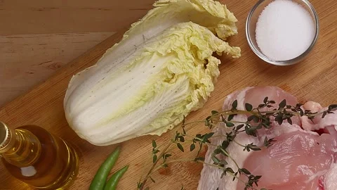 Thyme garlic ginger chilli Chinese cabbage onion lemon served on grey plate.. Stock Footage 252136993