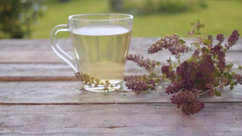Thyme tea in glass mug Stock Footage 137806243