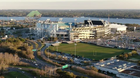 TIAA Bank Field and practice fields beside the St. Johns River Stock Footage 104883409