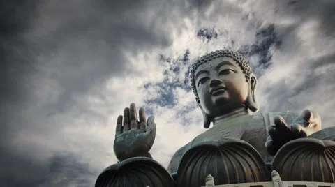 Tian Tan Buddha statue storm cloudy sky background. Lantau Island, Hong Kong. Stock Footage 40349985