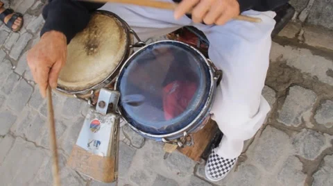 Tibales or Bongo drums and cow bell being played in Havana Stock Footage 45521564