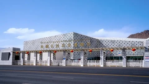 Tibet natural science museum patterned facade and entrance Video stock 345883569