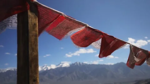 Tibetan Buddhist Prayer Flags Against Snow-Capped Himalayan Peaks Stock-Footage 339268629