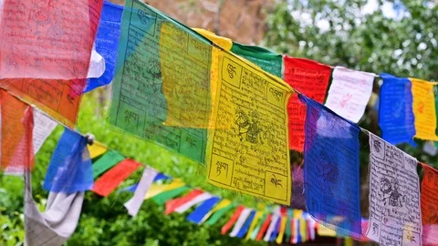 Tibetan buddhist prayer flags blowing in the wind Stock Footage 113578643