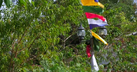 Tibetan flags in monastery waving in the wind Stock Footage 233107870