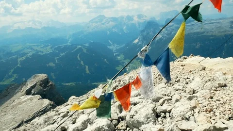Tibetan flags waving on a mountain top in South Tyrol Stock Footage 95636025