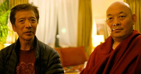 Tibetan Monk Interview segments on healing, kindness &amp; Buddhism Stock Footage 109375236