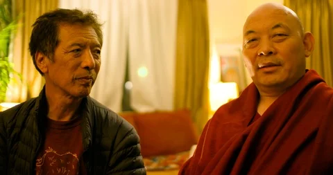 Tibetan Monk Interview segments on healing, kindness &amp; Buddhism Stock Footage 109375633