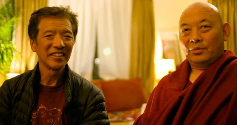 Tibetan Monk Interview segments on healing, kindness &amp; Buddhism Stock Footage 109375724