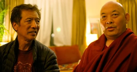 Tibetan Monk Interview segments on healing, kindness &amp; Buddhism Stock Footage 109375730