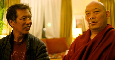 Tibetan Monk Interview segments on healing, kindness &amp; Buddhism Stock Footage 109375799