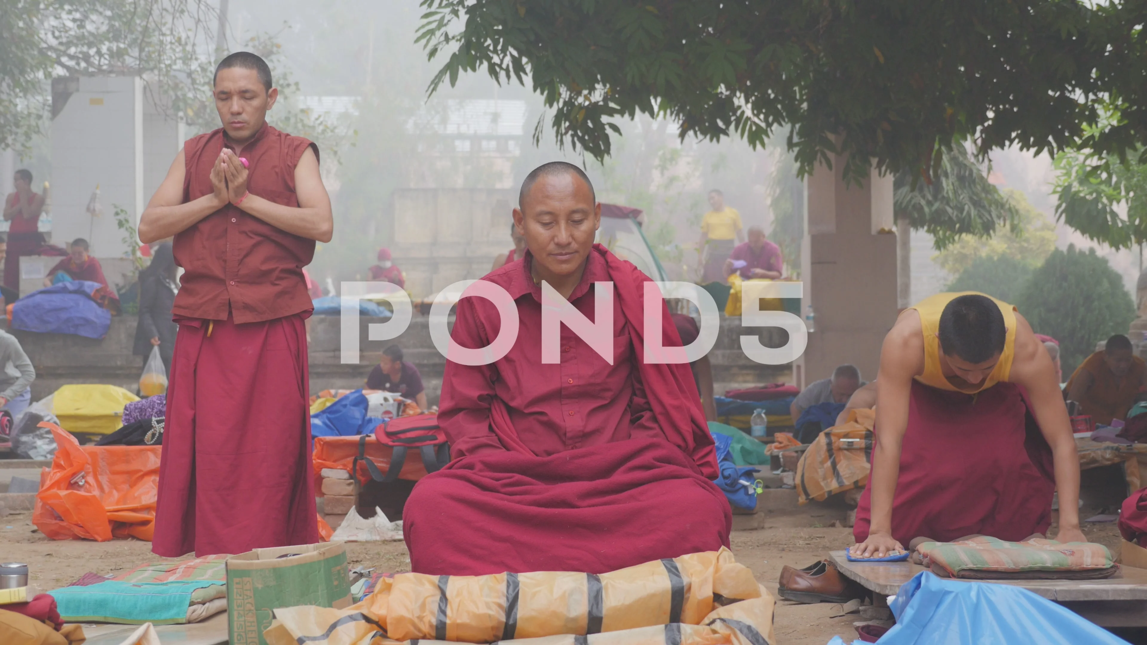 Tibetan monk meditating and prostrating,BodhGaya,Mahabodhi Temple  Complex,India, image size:3840x2160