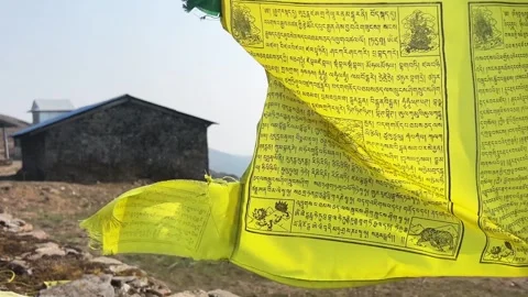 Tibetan multicolored flag waving Stock Footage 294587809