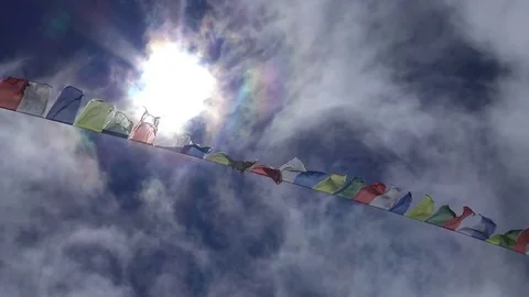 Tibetan prayer flags and solar halo Video stock 74466401