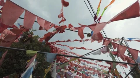 Tibetan Prayer Flags Beneath Cloudy Skies at Fuguo Monastery Stock Footage 336700479