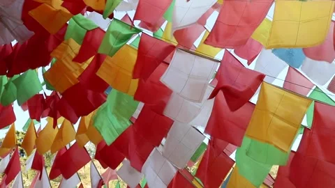Tibetan prayer flags: colorful rectangular cloth, often found strung along tr Stock Footage 136512014