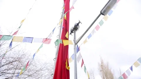 Tibetan prayer flags flapping in Monastery Stock Footage 84733186