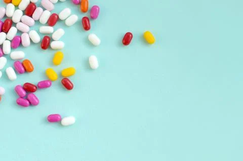 Tic tac hard mints pattern close up. Tic tac is popular due its minty fresh t Stock Photos