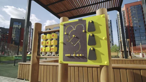 Tic tac toe and children maze on modern playground in park Vídeos de archivo 330283582