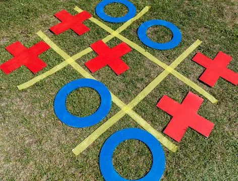 A tic-tac-toe board with red and blue squares Stock Photos