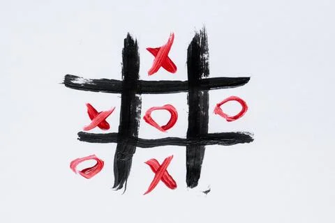 Tic-tac-toe drawn with a brush on a white background, board game Fotos de archivo