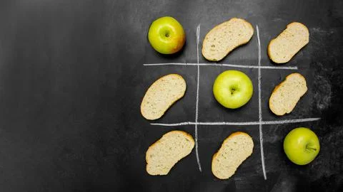 Tic-tac-toe game between harmful calories and healthy food Stock Photos
