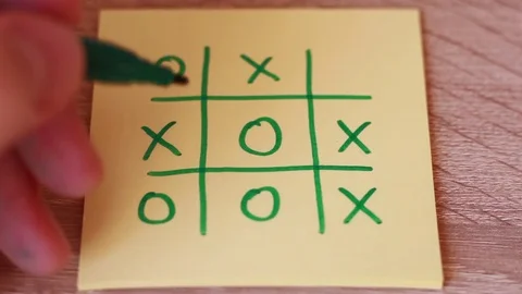 Tic tac toe on yellow sticker Stock Footage 85463883